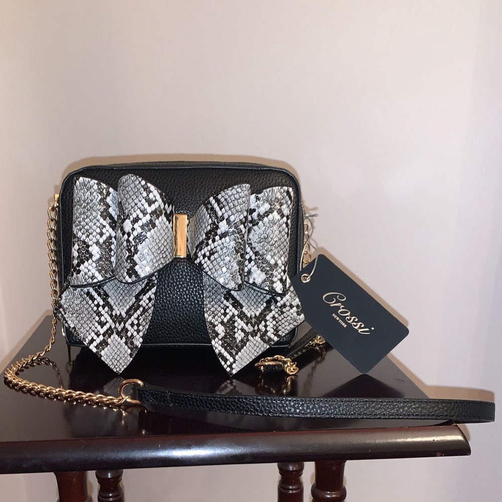 Crossi small, black, cross body purse with black/white snakeskin bow.